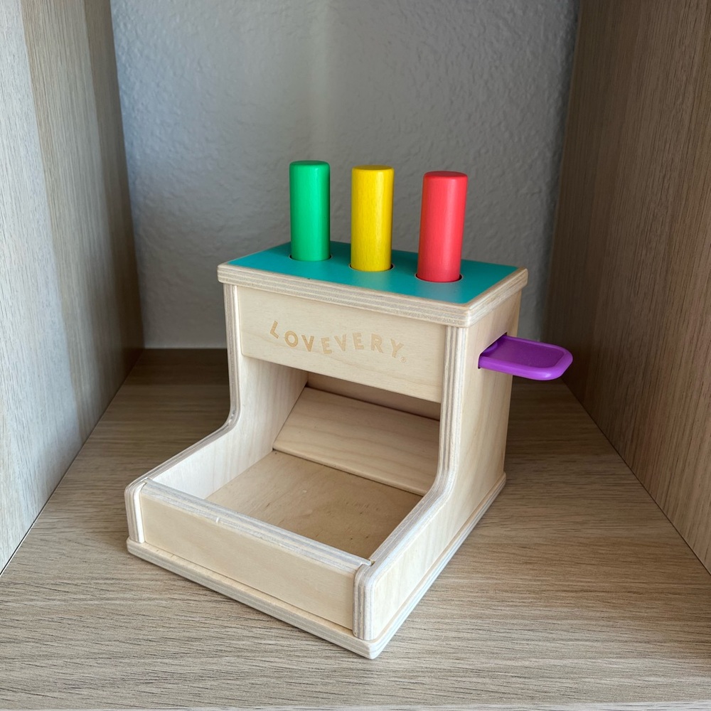 Lovevery Wooden Toy with Colorful Pegs